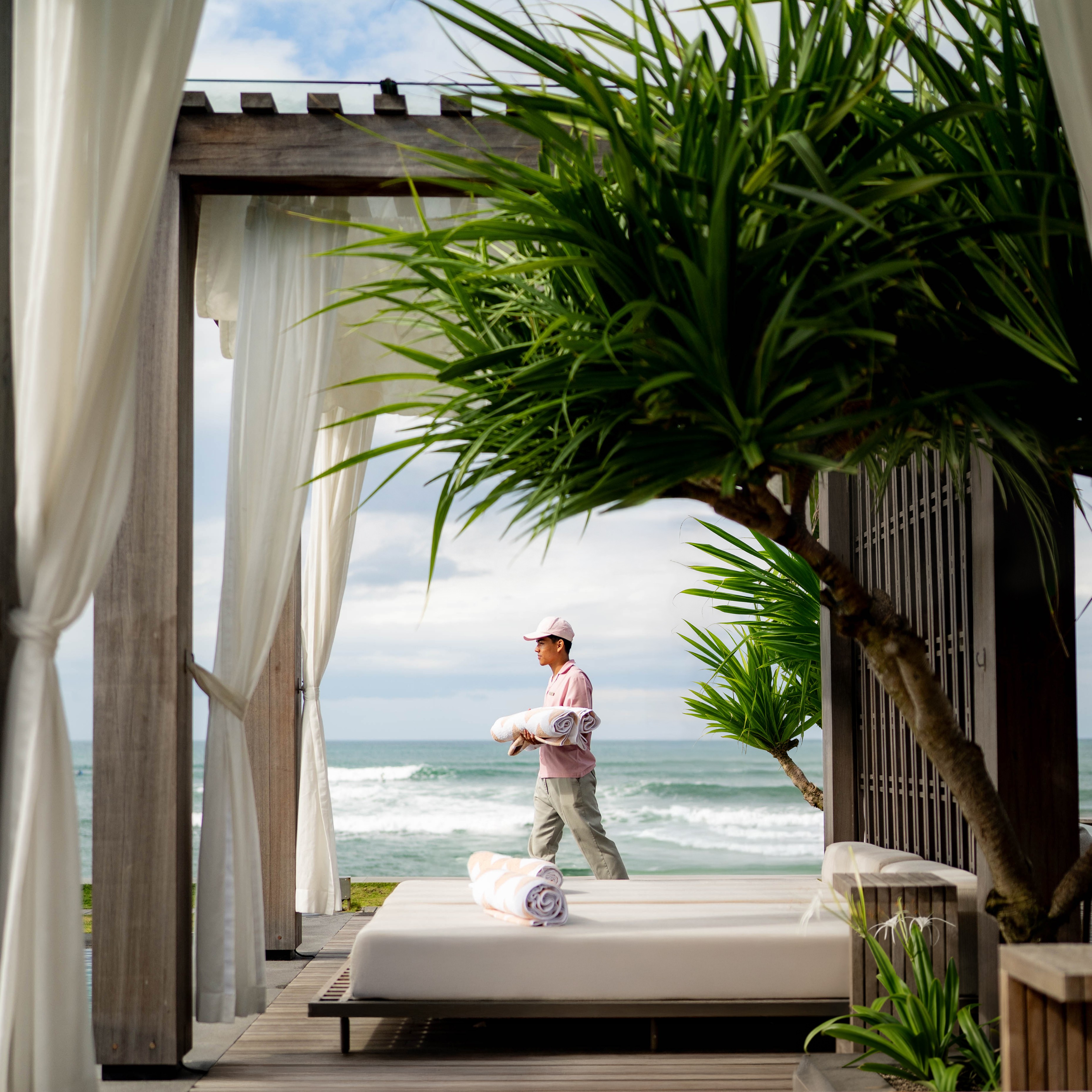 Staff delivering pool tower overlooking the Indian Ocean